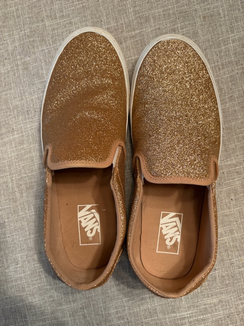 Women’s rose gold glitter slip ons